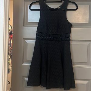 In excellent used condition black lace skater dress by Free People